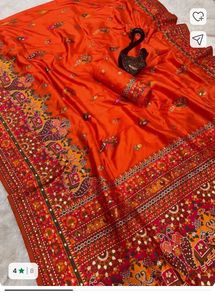 Vibrant Orange Embroidered Saree