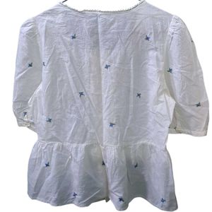 White Embroidered Peplum Top