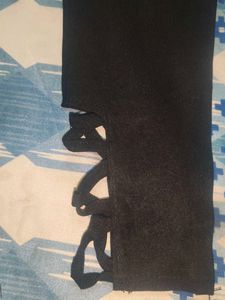 Stylish Black Pants with Decorative Buttons
