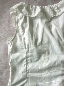 White Ruffled Neck Sleeveless Top