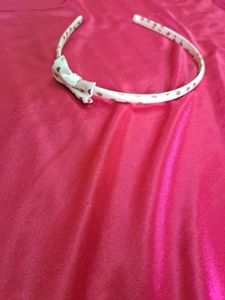 Gorgeous Beige Gold Headband With Hearts Detail