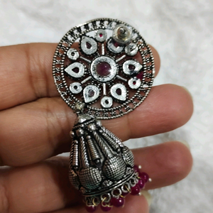 Silver look alike earing with Ruby stone