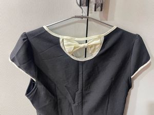 Chic Black Dress with Bow Detail