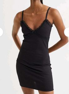 Chic Black Ribbed Mini Dress with Lace Trim
