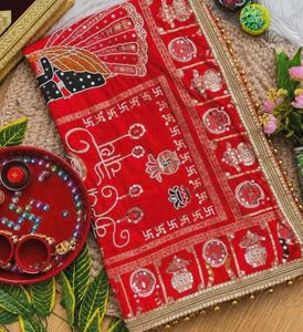 Vibrant Red Saree with Peacock Motif