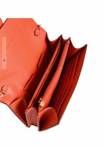 Vibrant Orange Clutch with Gold Hardware