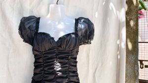 713. Chic Black Ruched Mini Dress