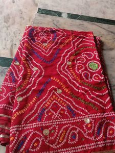 Vibrant Red Bandhani Saree with Intricate Designs