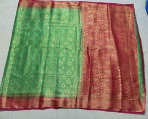 Green Silk Saree with Gold Border