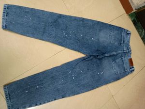 Stylish Blue Denim Jeans with Paint Splatter
