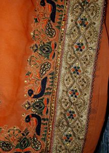Elegant Orange Embroidered Saree
