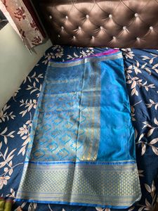 Vibrant Rani Pink Saree with sky blue blouse