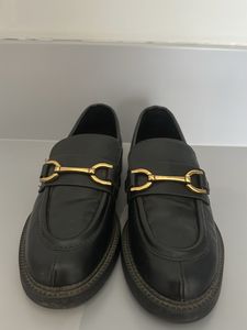 Stylish Black Loafers with Gold Hardware