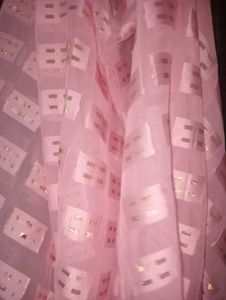 Elegant Pink Saree with Gold Accents