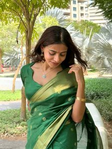 Elegant Green Saree with Gold Border