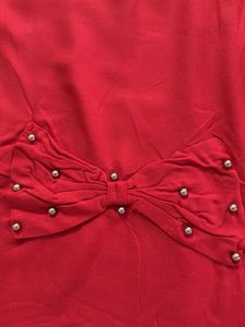 Chic Red Top with Bow Accent