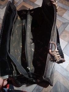 Chic Black Patent Handbag with Gold Chain