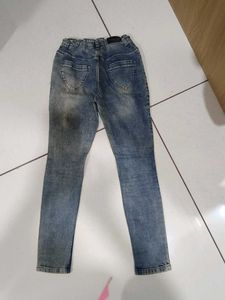 Distressed Blue Denim Jeans