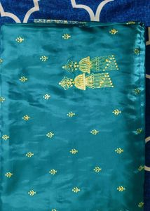 Elegant Teal Embroidered Silk Saree