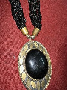 Elegant Beaded Necklace with Black Stone Pendant