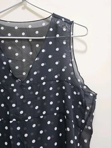 Polka dot sheer top