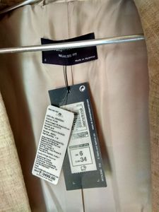 Marks and Spencer linen blazer with ruched sleeves