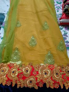 net embroidery saree with velvet blouse