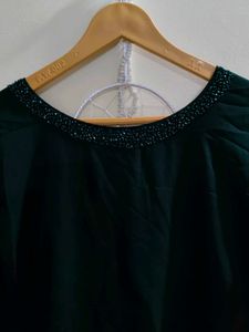 Elegant Green Kurta with Embellished Neckline