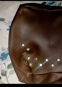 Stylish Brown Handbag with Charm
