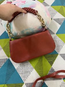 Stylish Brown Handbag with Gold Chain Strap