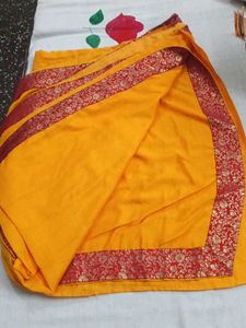 Vibrant Yellow Saree with Red Border