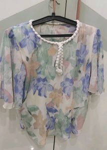 Floral Print Blouse with unique neckline detail