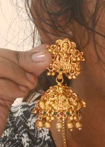 Intricate Gold Lakshmi Jhumka Earrings