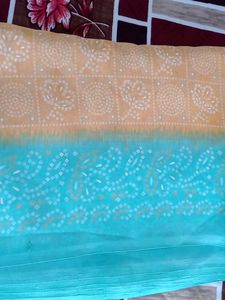 Beautiful orange and green Saree
