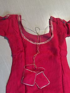 Vibrant pink suit with Silver Border