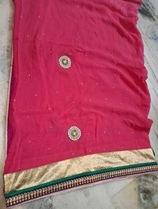 Elegant Pink Saree with Embellishments
