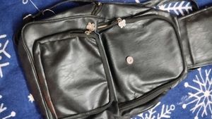 Stylish Black Crossbody Bag with Tan Accents