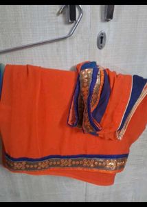Vibrant Orange Saree with Embellished Border