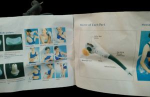 Evexia Handheld Massager with 7 attachments