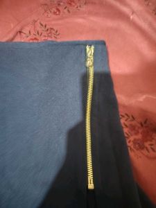 Stylish Navy Blue Pants with Gold Zipper Detail