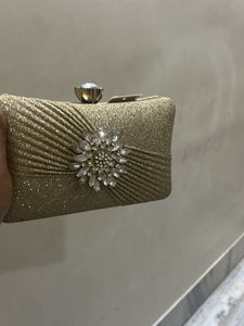 Sparkling Gold Clutch with Rhinestone Embellishmen
