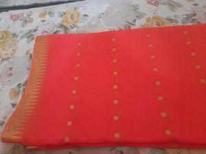 Vibrant Orange Saree with Golden