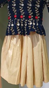 golden skirt with blue paplon top💙