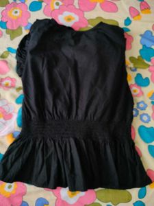 Chic Black Peplum Top with Puff Sleeves