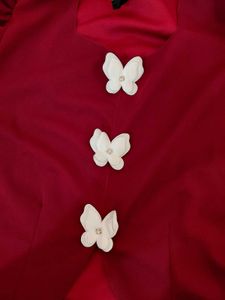 brand new Maroon Top with Butterfly Embellishments