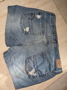 Light Wash Distressed Denim Shorts