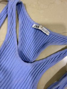 blue cutout body suit