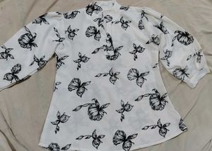 A beautiful high low top, fits anyone