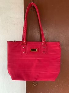 Brand new spacious sidebag or handbag in Rani pink or fusia pink colour