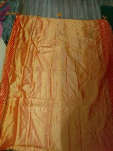 Stunning Orange Saree with Red Border